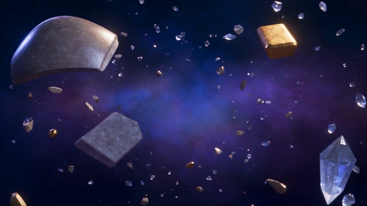 Shards of silver, gold and iron tumble through the dark