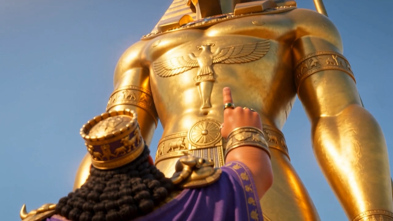The statue's golden torso gleams against the blue sky