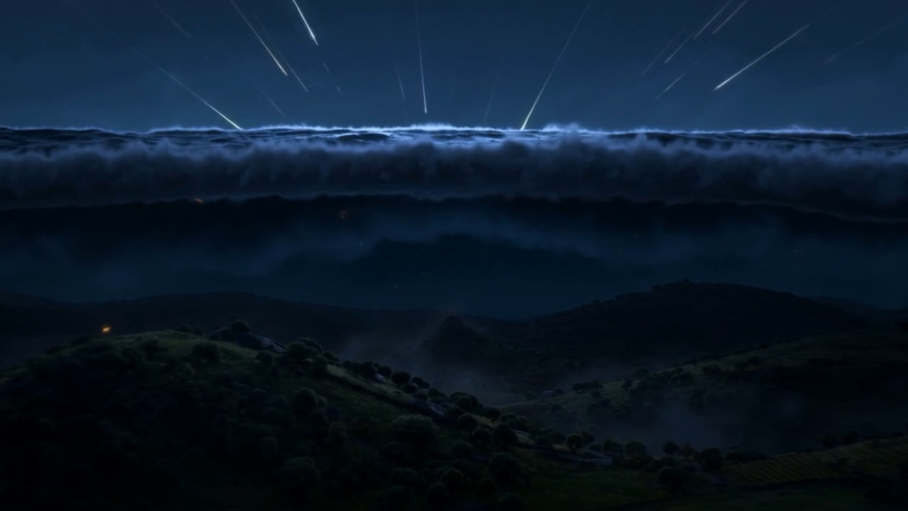 A black wall of water, standing over the hills