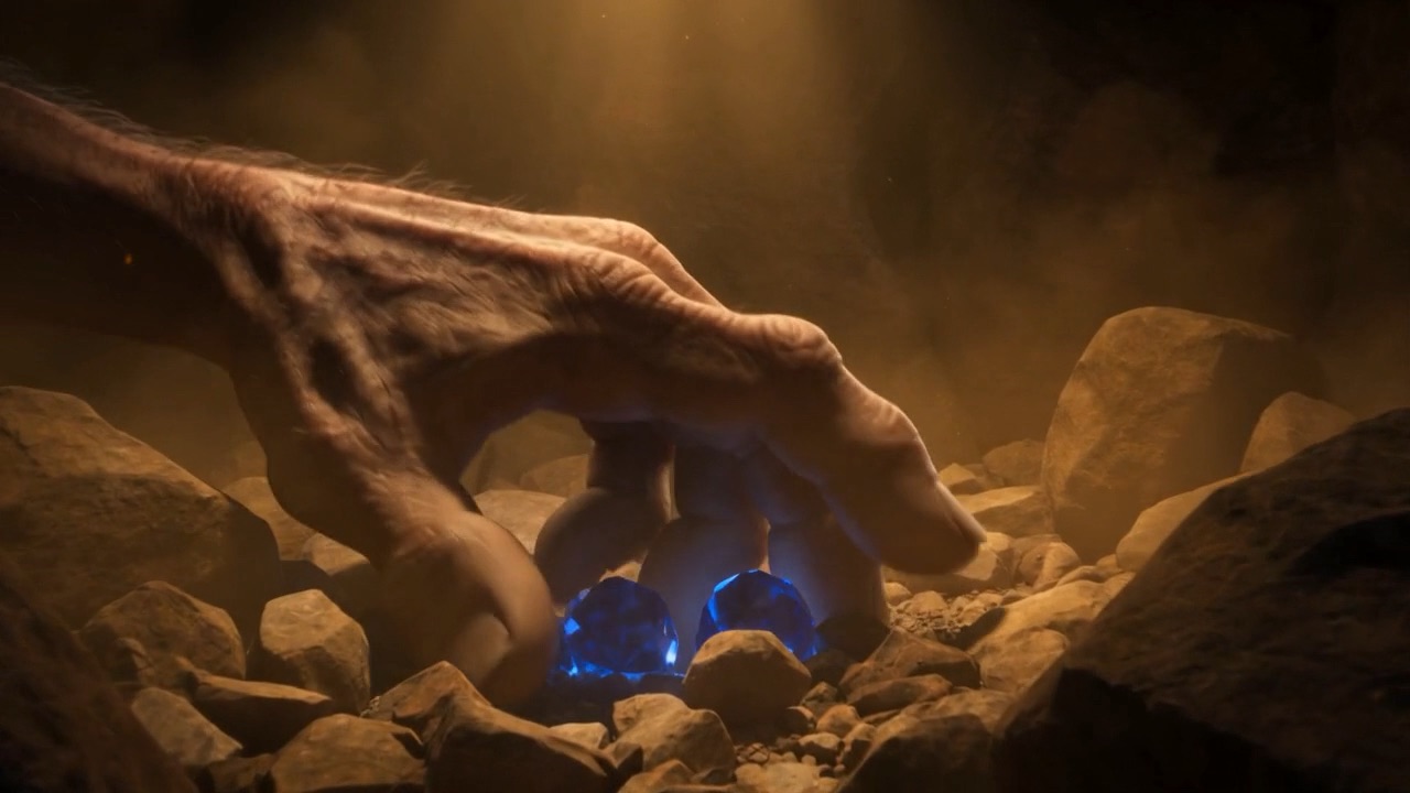 A hand reaching into rubble
