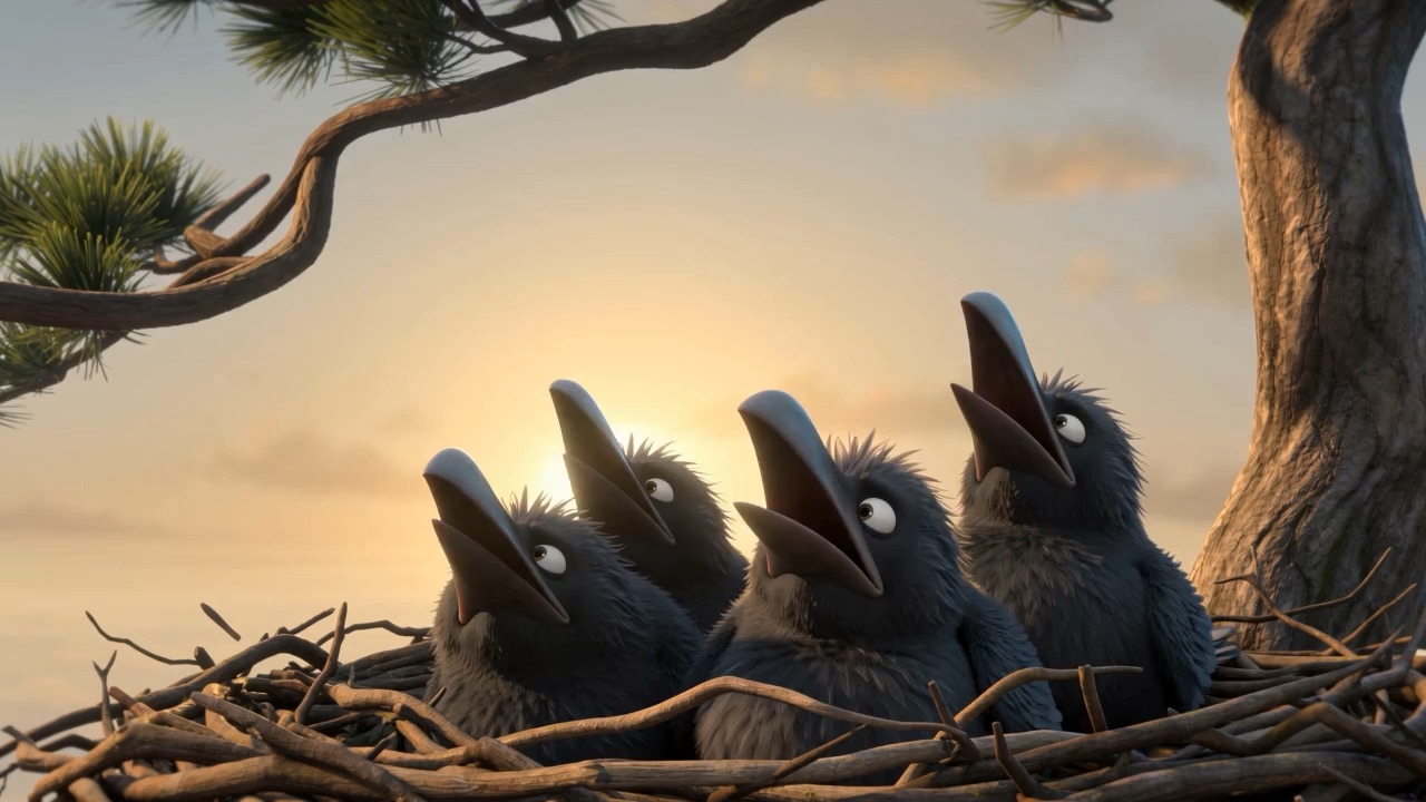 Raven chicks in a nest on a windblown pine