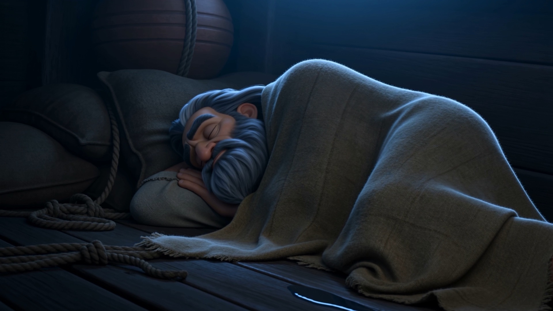 Below deck — Jonah fast asleep under a blanket