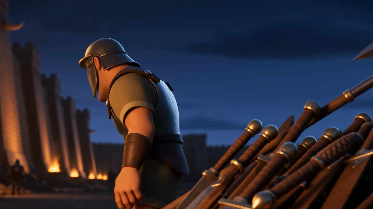 A soldier lays a bundle against the wall