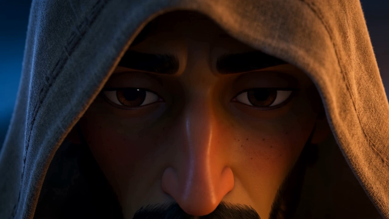 Dark eyes under a hood, thinking it through