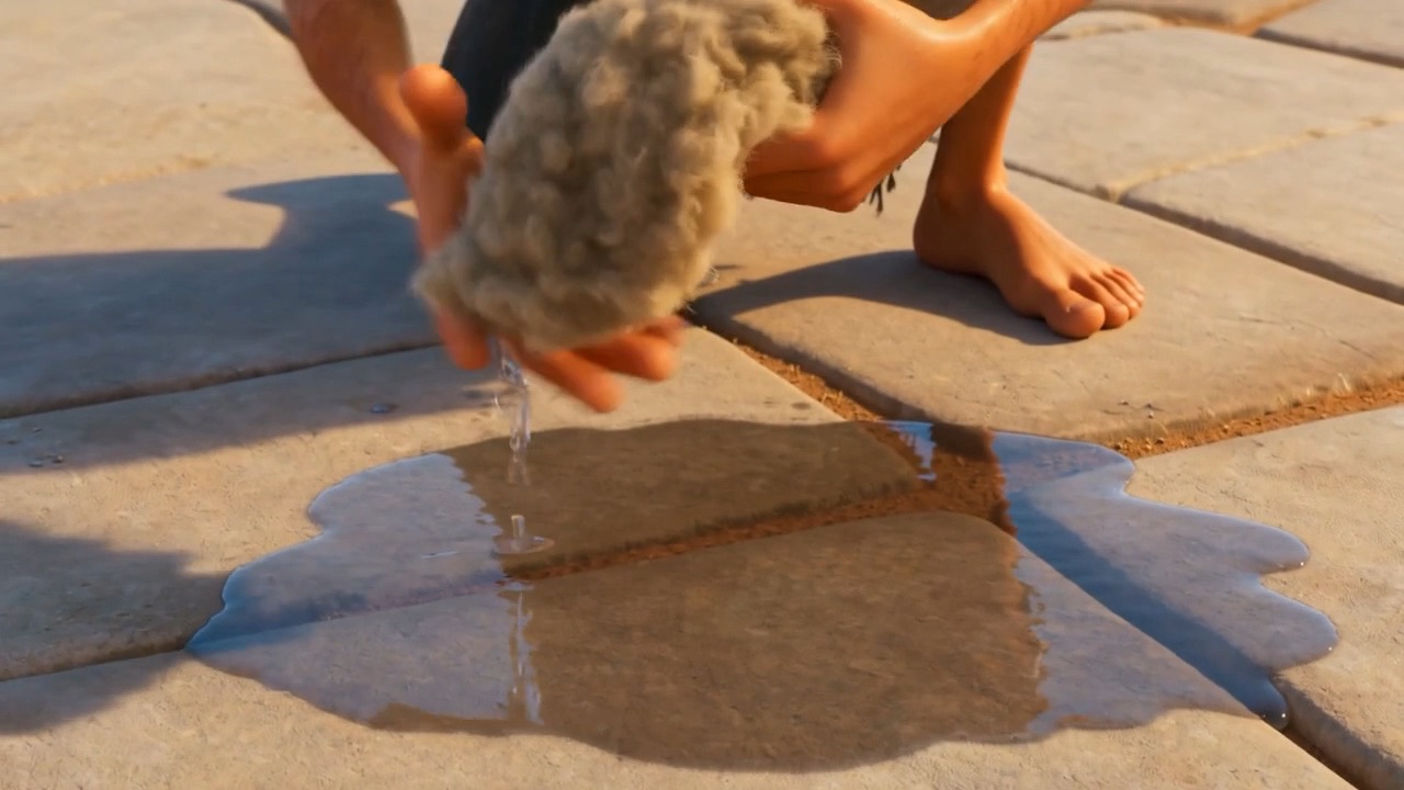 He wrings it out — a bowlful of water