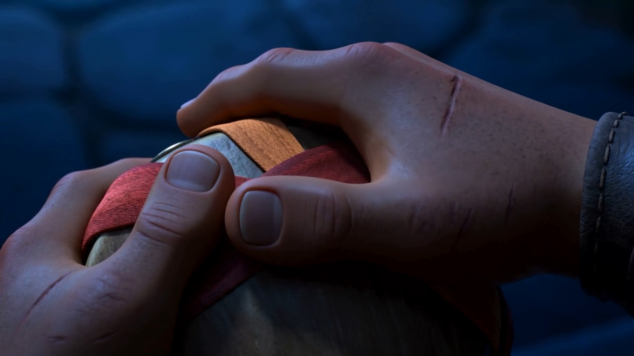 Close — ribbons, and a thumb on the rim