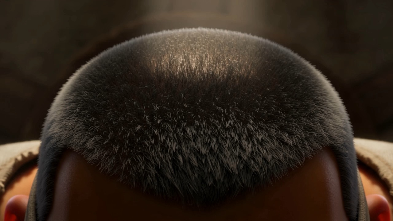 Close on a shaved scalp — with new hair coming through