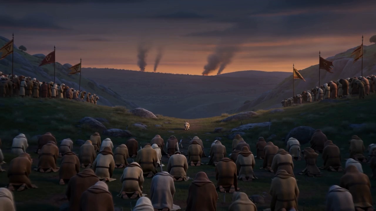 An enormous crowd kneeling on a hillside at dusk