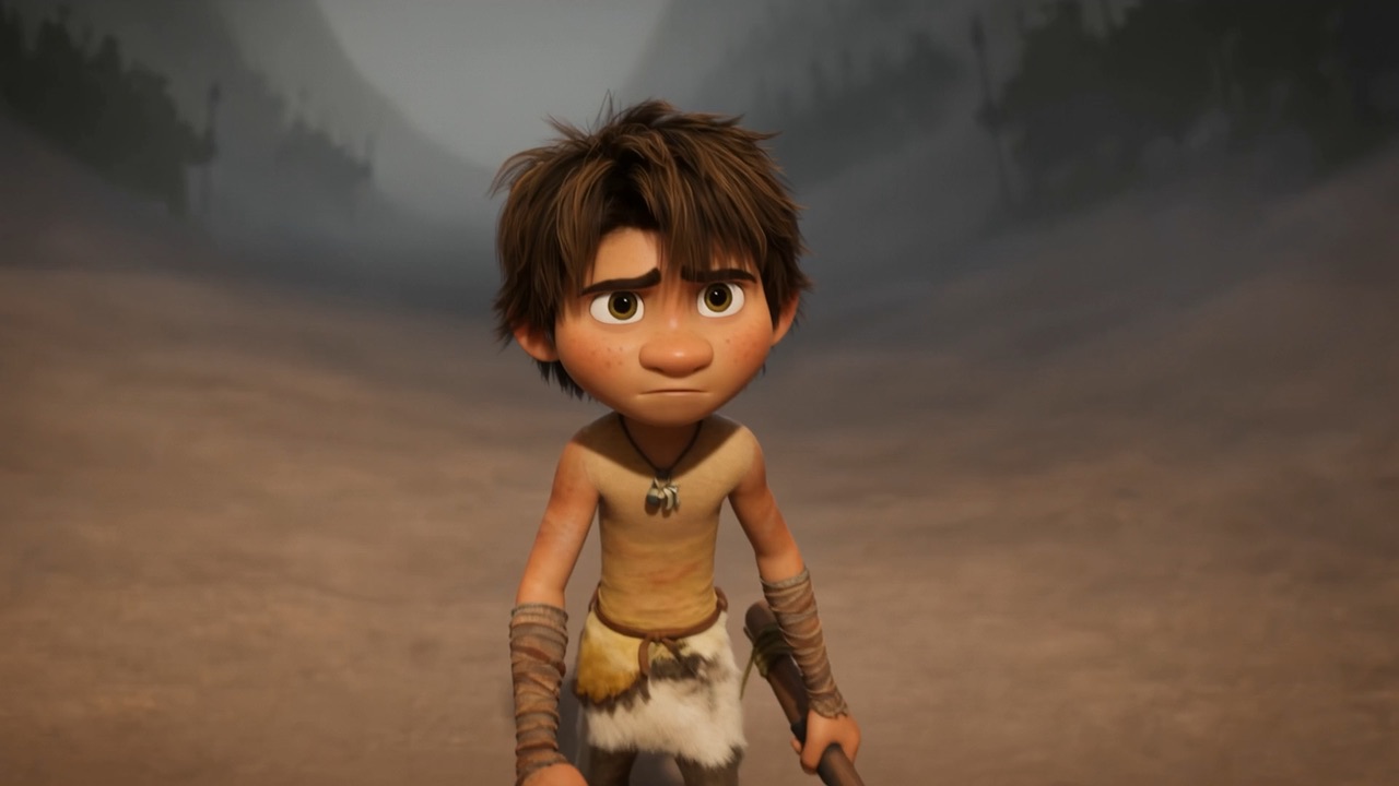 A boy with a sling looks up, unafraid