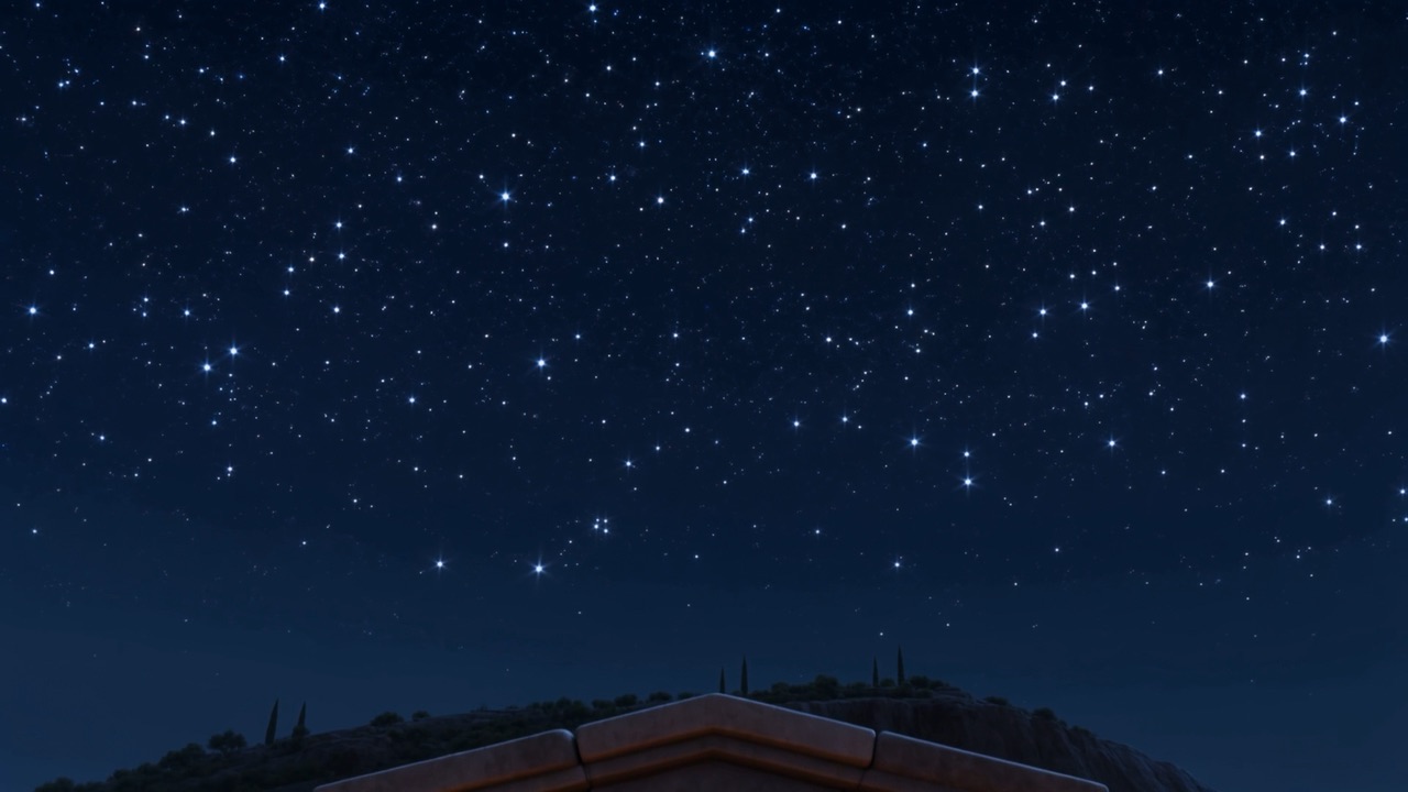 Columns stand black against a sky thick with stars