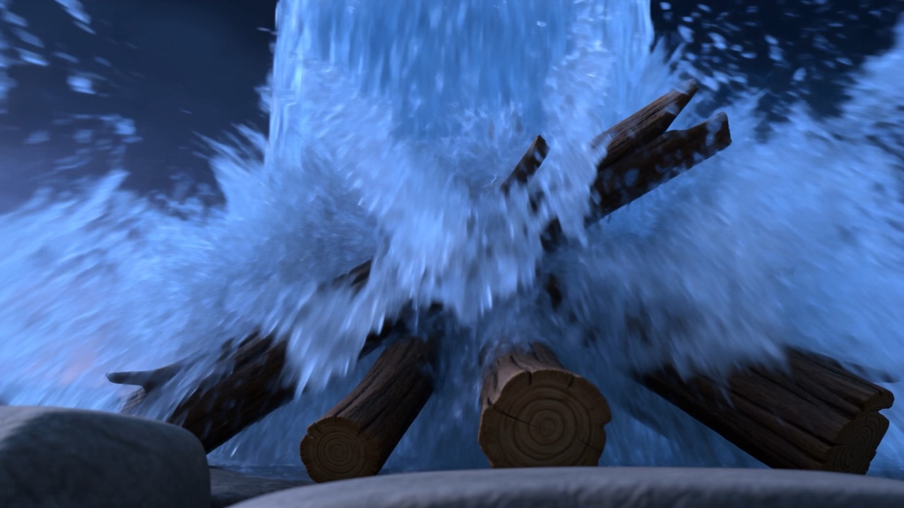 Water crashes over the wood in the blue dusk
