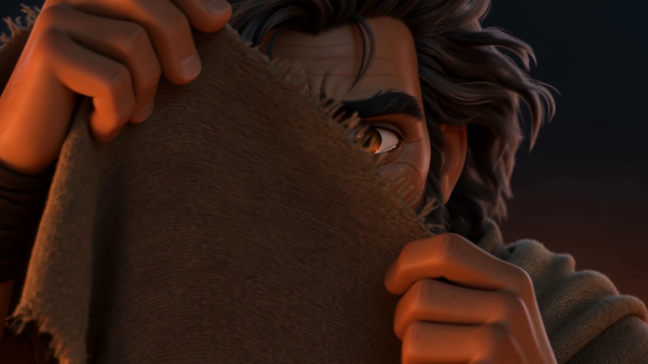 He pulls his cloak up over his face