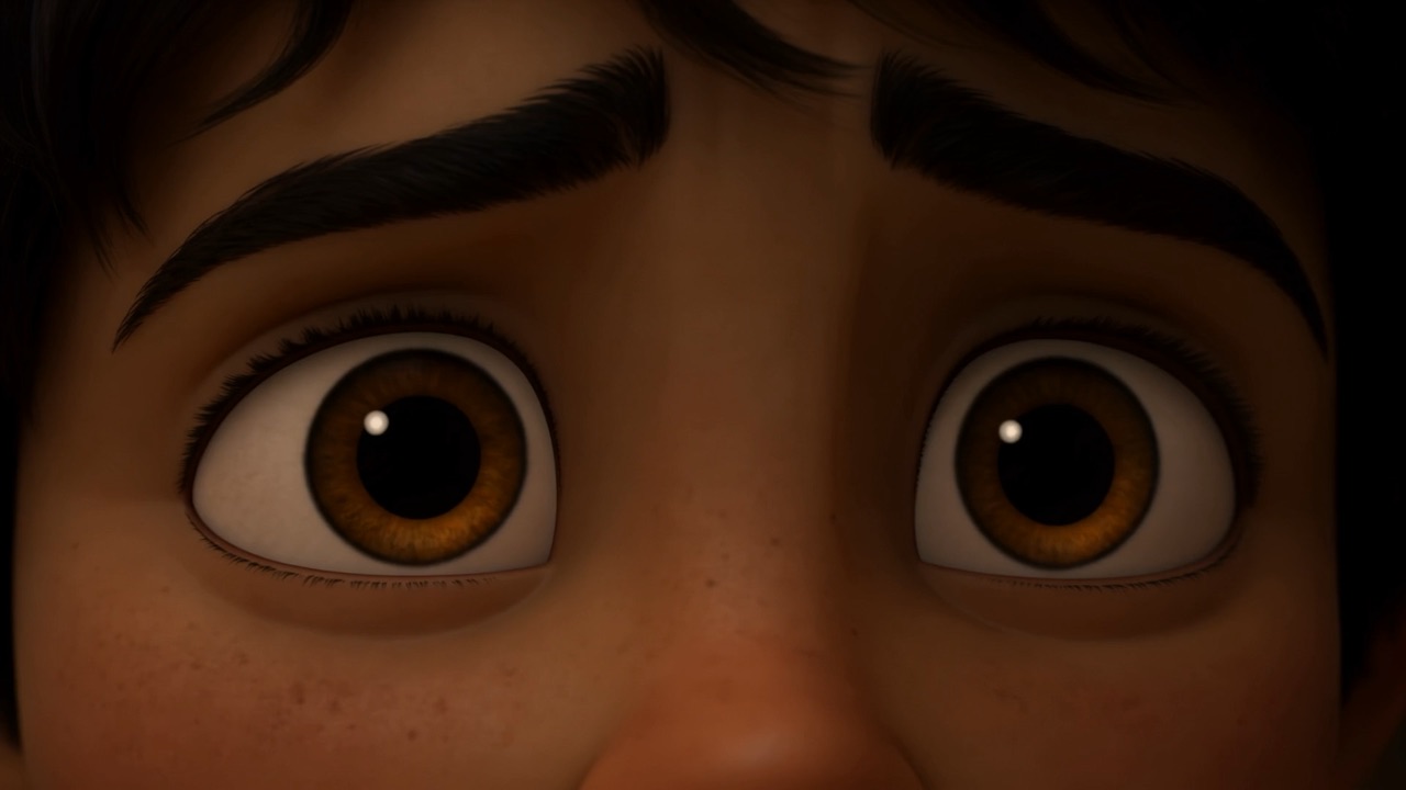 A boy's eyes, very wide