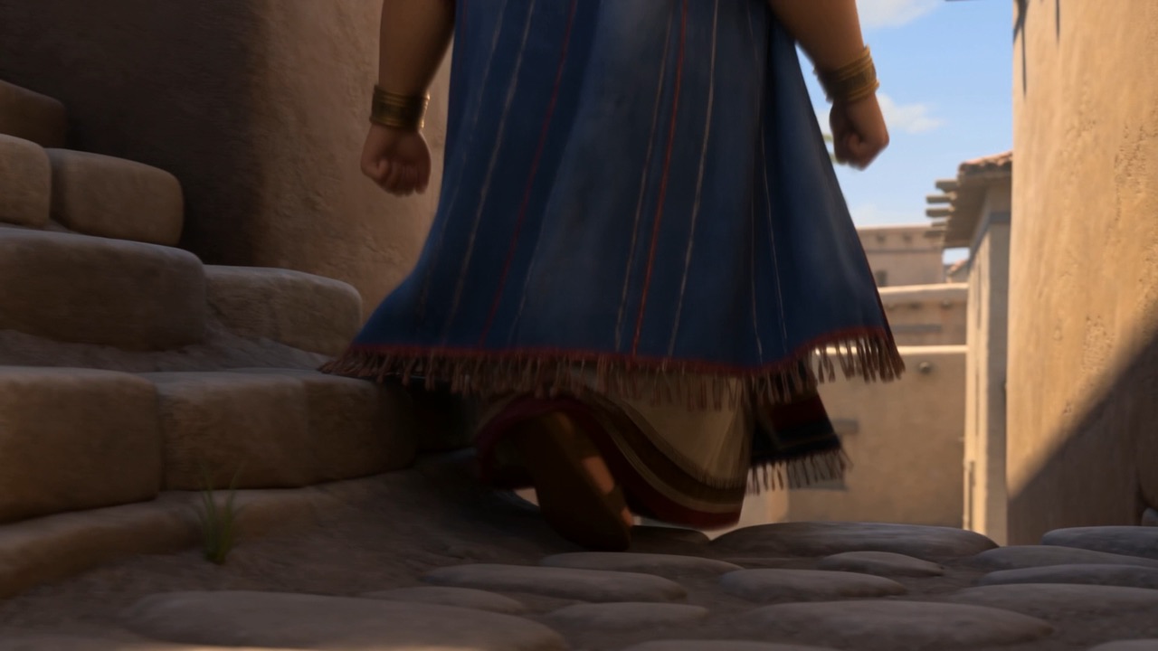 She comes down the outside stair, fast