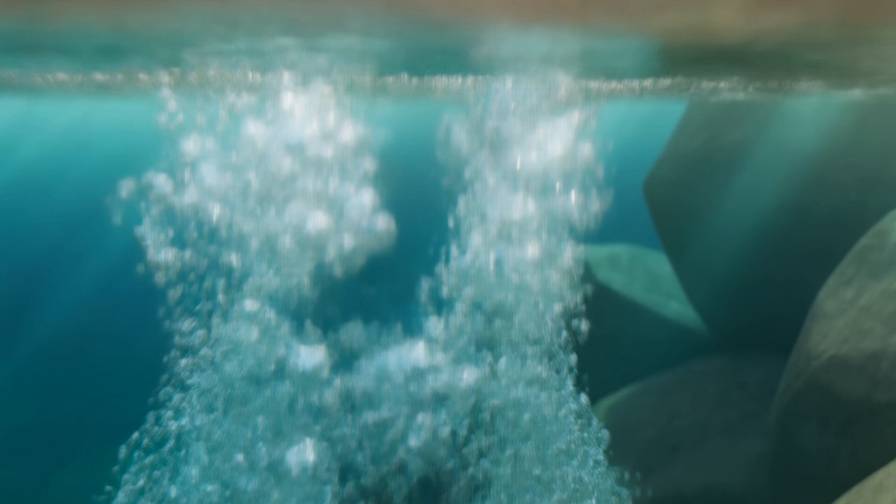 Bubbles coming up through clear water