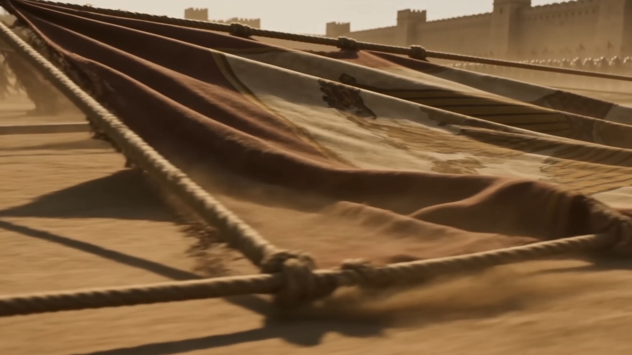 Captured banners dragged face-down in the dirt