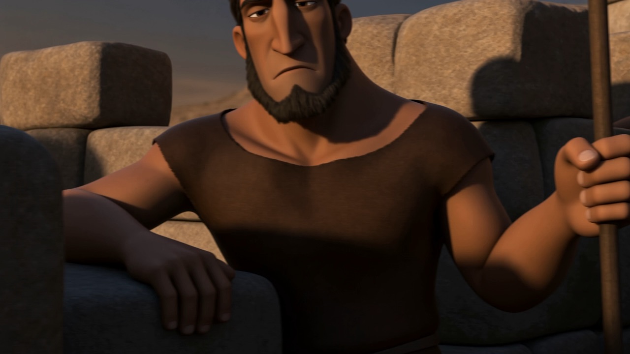 A man on the battlements, gripping a spear