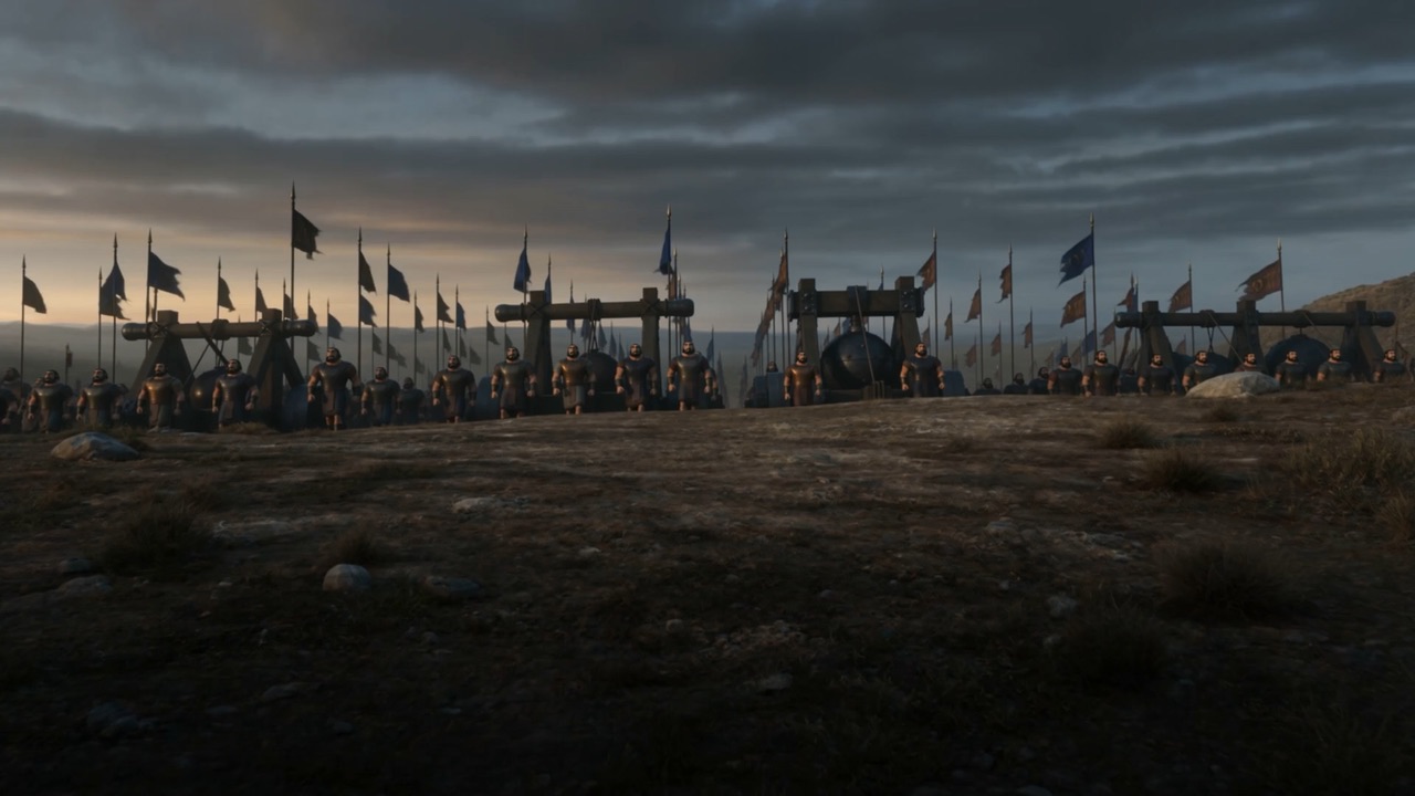 Siege engines being hauled forward across the ground