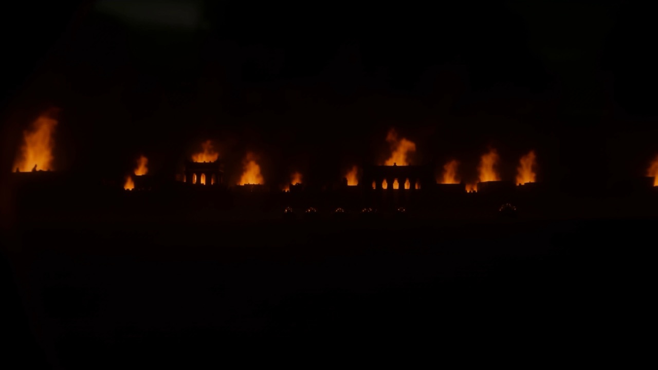 Far off — just a row of small fires on a plain