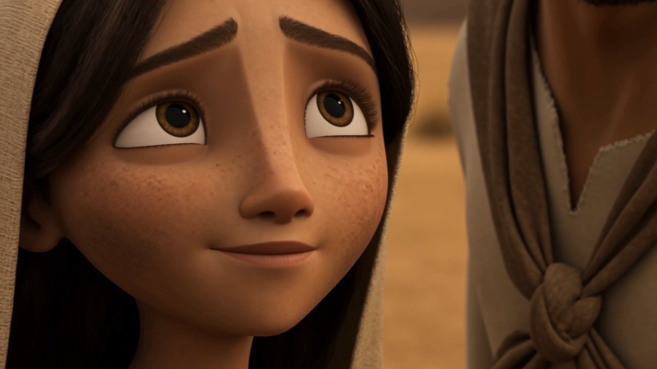 A girl's face, looking up at her father