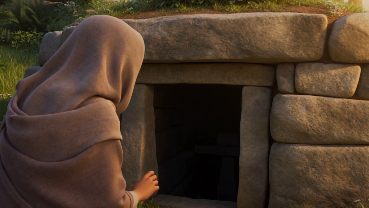 A hand on the doorway of an open tomb