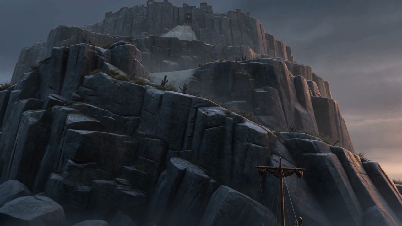A wall of black basalt cliffs