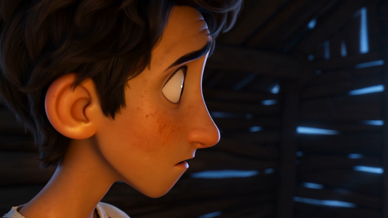 The boy's gaze pulls sideways, slowly