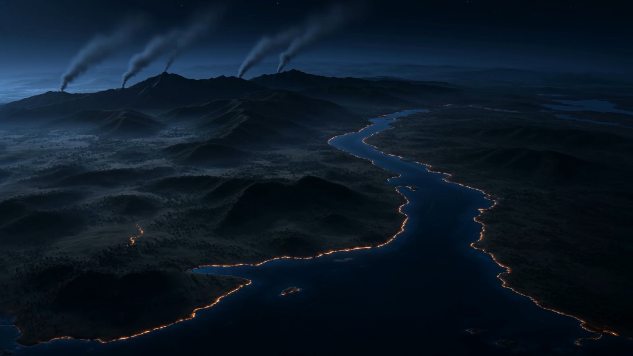 Beyond the ridgelines, thin columns of smoke lean together in the night wind