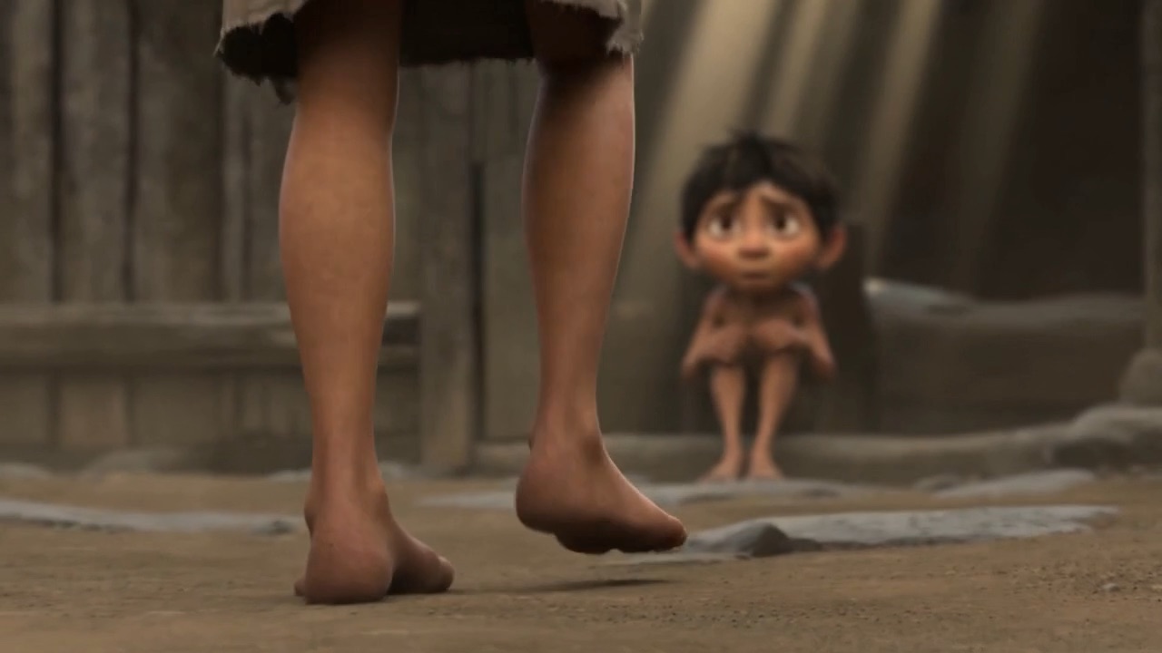 Across the lane, in a doorway, a smaller boy who cannot look away from her bread