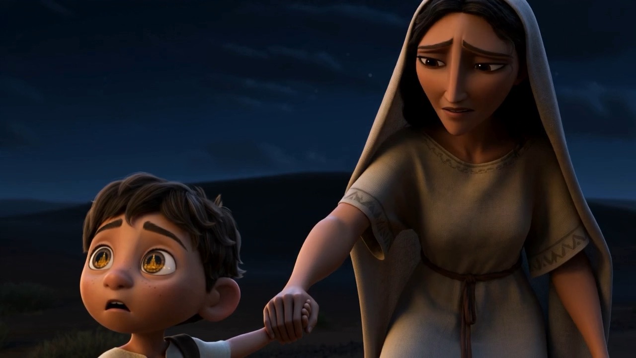 His mother feels the drag on her hand, and looks down