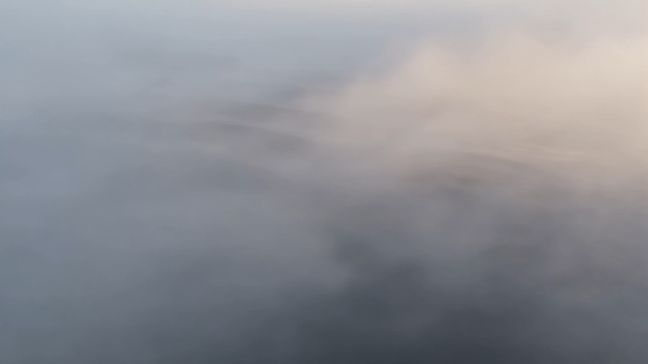 The gold thins to pearl, and the pearl goes to mist