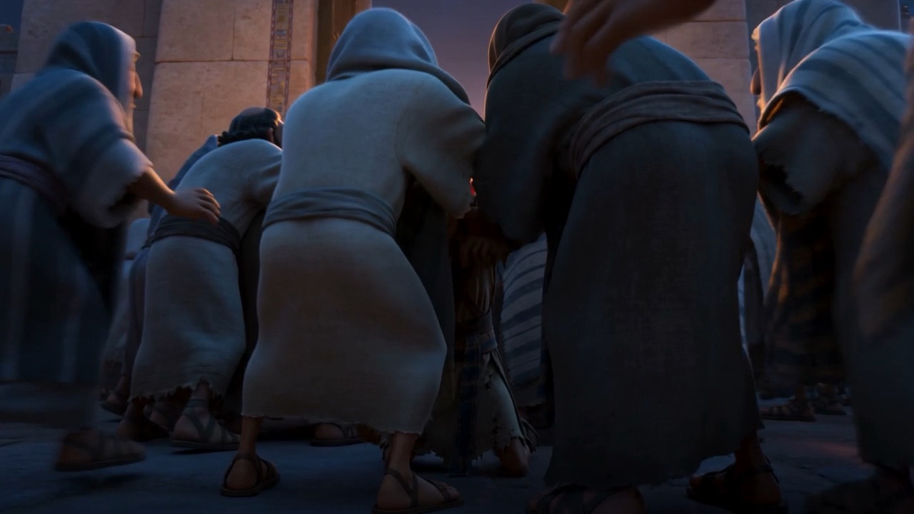 The crowd surges toward the gate in the dusk