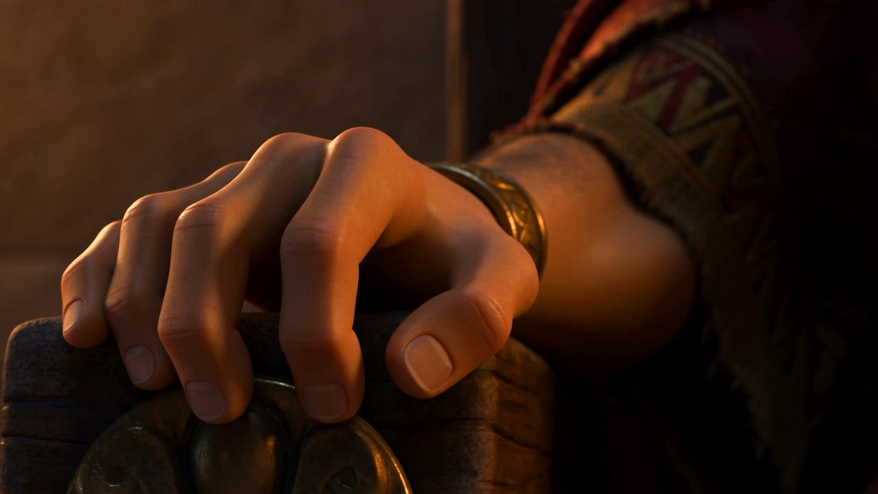 Close on the king's hand: clenched — then, frame by frame, loosening